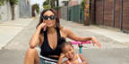 Jeannie Mai was seen wearing black Miu Miu MU 09WS 1AB5S0 sunglasses in her Instagram post