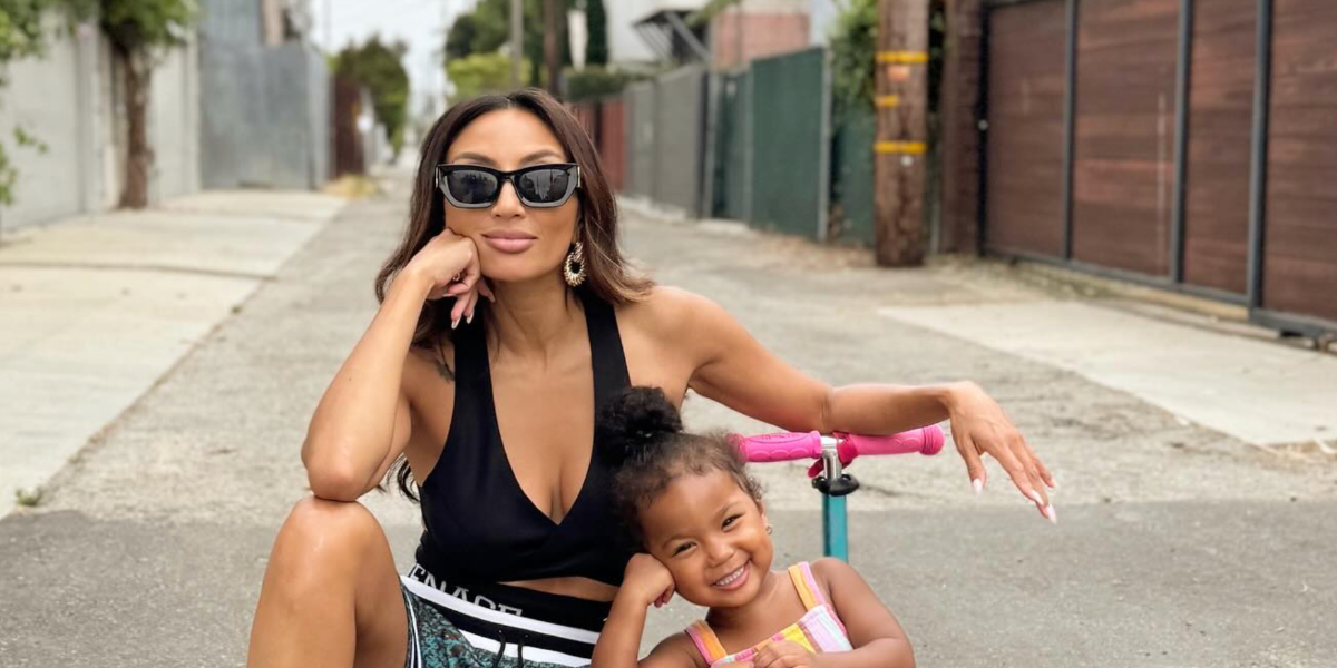 Jeannie Mai was seen wearing black Miu Miu MU 09WS 1AB5S0 sunglasses in her Instagram post