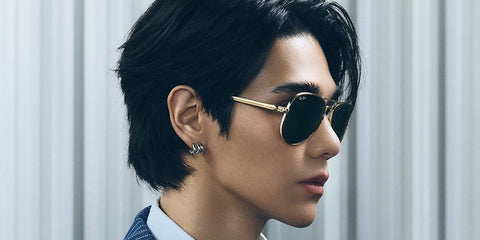 Thai singer Jeff Satur was seen wearing gold Ray-Ban Aviator Max RB 3925 001/31 sunglasses in a Ray-Ban campaign.