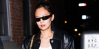 Jennie Kim of BLACKPINK was seen wearing black Ray-Ban RB 4335 601/71 wraparound sunglasses in New York City, May 2026.
