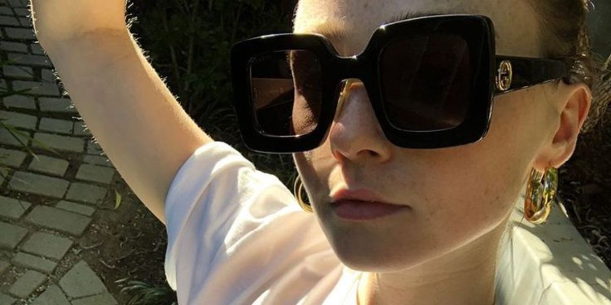 Jessica Barden was seen wearing black Gucci GG0780S 005 oversized butterfly sunglasses