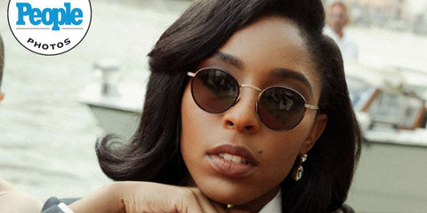 Actress Jessica Williams was seen wearing gold and havana Giorgio Armani AR6163J 3002/2A round sunglasses at the Venice Film Festival 2025 as featured on People.com