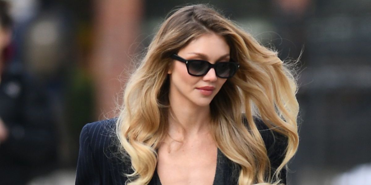 Jessie Andrews was seen wearing black Saint Laurent Sun SL 522 001 sunglasses while filming a video for Mytheresa in New York City, 2024