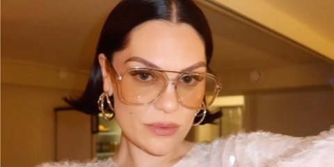 Jessie J was seen wearing transparent beige Saint Laurent SL 545 002 aviator sunglasses in Copenhagen, July 2026.