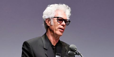 Film director Jim Jarmusch was seen wearing black Saint Laurent Sun SL 318 001 sunglasses at the New York Film Festival 2025. Shop online now on Pretavoir