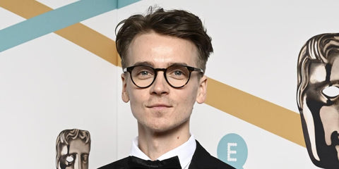 Joe Sugg was seen wearing tortoiseshell Garrett Leight Winward 1050 SPBRNSH optical glasses to attend the 2024 BAFTA Awards