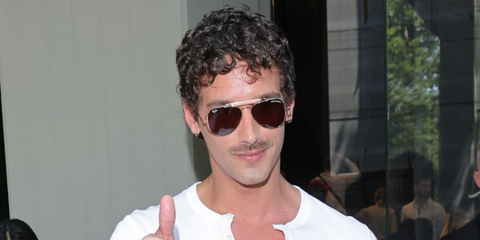 Spanish actor Joel Sanchez was seen wearing gold Ray-Ban The Outdoorsman by Dolce&Gabbana RB 3029M 001/73 aviator sunglasses at the Dolce & Gabbana Menswear Spring Summer 2027 fashion show during Milan Men's Fashion Week