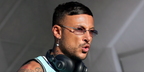 French DJ and producer Joezi was seen wearing Miu Miu MU A54S 5AK04O rimless oval sunglasses onstage at the Coachella Music Festival 2026.