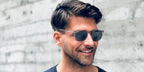 Johannes Huebl was seen wearing transparent Saint Laurent Sun SL 623 004 sunglasses with grey lenses in his Instagram post