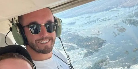 Scottish footballer John McGinn of Aston Villa was seen wearing red tortoiseshell Ray-Ban Clubmaster RB 3016 990/58 Polarised sunglasses in Zimbabwe, June 2023. Shop online now on Pretavoir