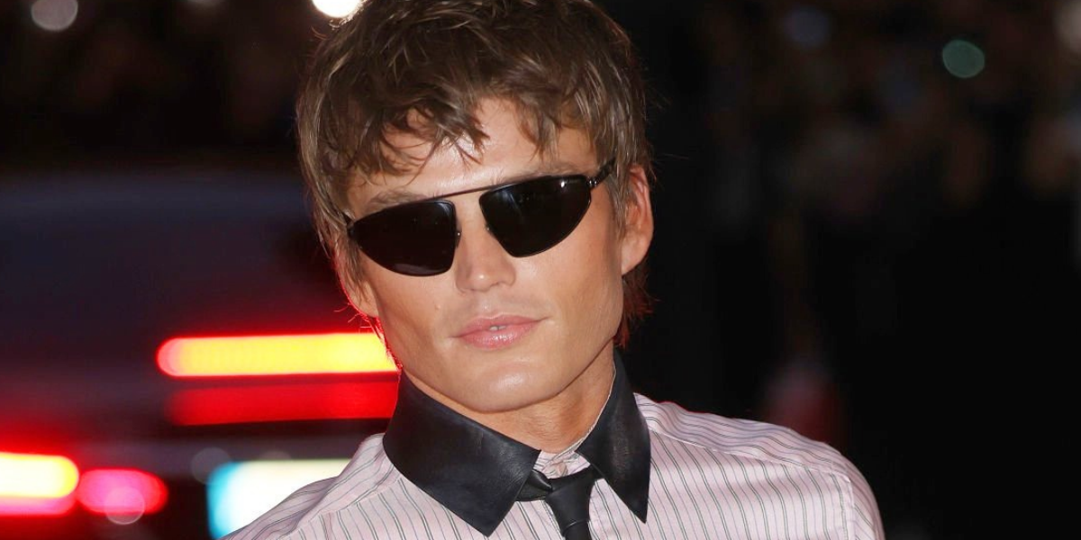 Australian model Jordan Barrett wore dark ruthenium Tom Ford Parker-02 TF1399 13A sunglasses at the Tom Ford Spring Summer 2027 show during Paris Fashion Week.