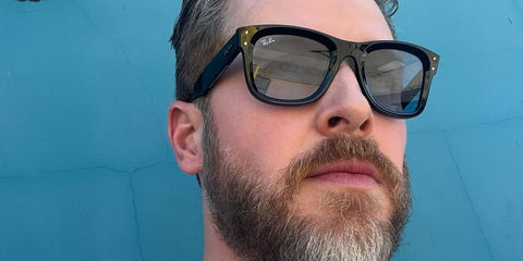 Actor Josh Dallas was seen wearing black Ray-Ban Wayfarer Reverse RB R0502S 6677/72 sunglasses with light blue lenses in his Instagram post, July 2025. Shop online now on Pretavoir