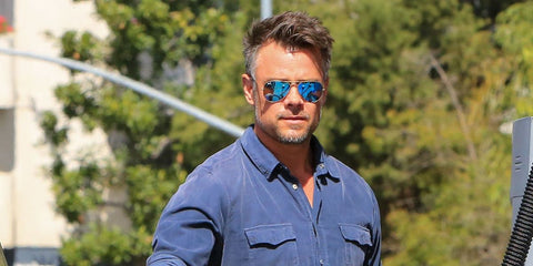 Josh Duhamel was seen wearing gold Ray-Ban Aviator 3025 112/17 Blue Flash Mirror sunglasses in Los Angeles