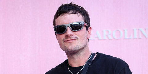 Josh Hutcherson was seen wearing grey metal Prada Linea Rossa SPS 05Z 16X7W1 sunglasses at the Carolina Herrera Spring/Summer 2026 fashion show during New York Fashion Week. Shop online now on Pretavoir