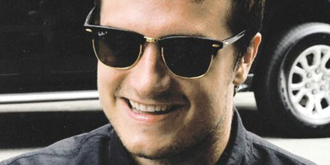 Josh Hutcherson was seen wearing the iconic Ray-Ban Clubmaster RB 3016 901/58 Polarised black sunglasses. Shop online now on Pretavoir