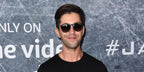 Actor Josh Peck was seen wearing rubber black Ray-Ban Erika 4171 6228G round sunglasses at the premiere of "Tom Clancy's Jack Ryan" during Los Angeles Fleet Week 2018.