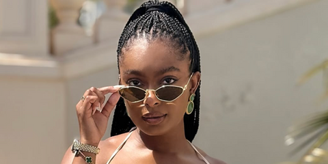 Internet personality Jourdan Riane was seen wearing gold Miu Miu MU 56ZS 5AK09Z sunglasses in her Instagram post, June 2025.