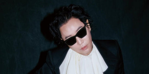 South Korean musician and composer Jung Jae-hyung was seen wearing black Alexander McQueen AM0536S 001 sunglasses in an Allure Korea feature, January 2026.