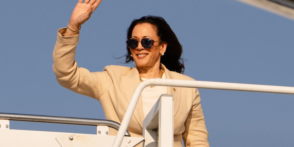 Kamala Harris is seen wearing brown Persol 3274S 108/56 Folding sunglasses with blue lenses