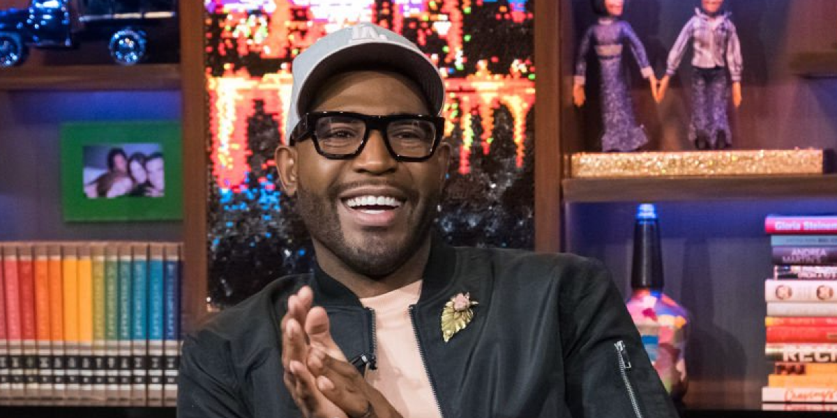 Karamo Brown is seen wearing Alexander McQueen AM0452O 001 glasses to Watch What Happens Live With Andy Cohen