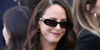 Kaya Scodelario wore black Balenciaga BB0510S 001 Nova Rectangle sunglasses at the Balenciaga Spring Summer 2027 show during Paris Fashion Week.