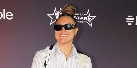 Basketball player Kayla McBride was seen wearing black Prada PR 17WS 1AB5S0 Symbole Sunglasses at the AT&T WNBA All-Star 2025 - Orange Carpet, July 2025. Shop online now on Pretavoir