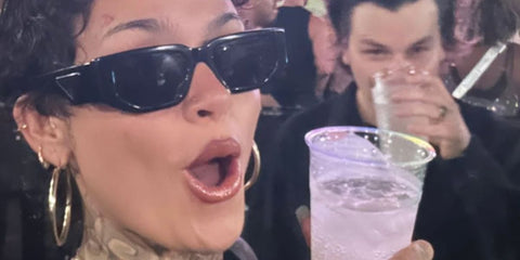 Kehlani was seen wearing black Prada PR 09ZS 1AB5S0 sunglasses with dark grey lenses at Beyonce's Renaissance concert