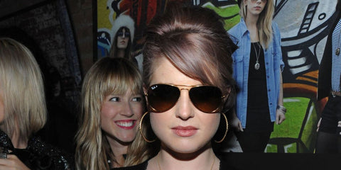Television personality Kelly Osbourne was seen wearing gold Ray-Ban Aviator RB 3025 112/M2 sunglasses with brown gradient Polarised lenses at the Ray-Ban Aviator: The Essentials Event in New York City