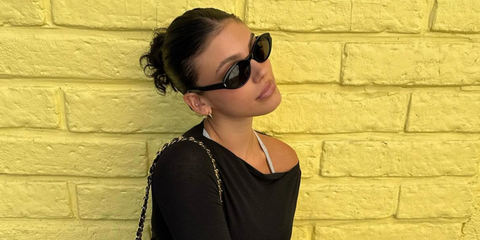 Internet personality Kelsey Cameline was seen wearing black Saint Laurent Sun SL 567 001 sunglasses in her Instagram post, August 2025.