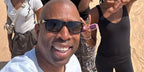 Kenny Smith was seen wearing black Persol 2803S 95/58 rectangular sunglasses during his family holiday in Abu Dhabi
