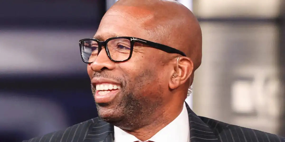 Kenny Smith was seen wearing black Tom Ford TF5818-B 001 Blue Control optical glasses in a TV show