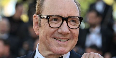 Kevin Spacey was seen wearing brown barchan Oliver Peoples Alfrey OV5570U 1794 optical glasses at La Battaille De Gaulle: L'Âge De Fer screening during Cannes Film Festival 2026