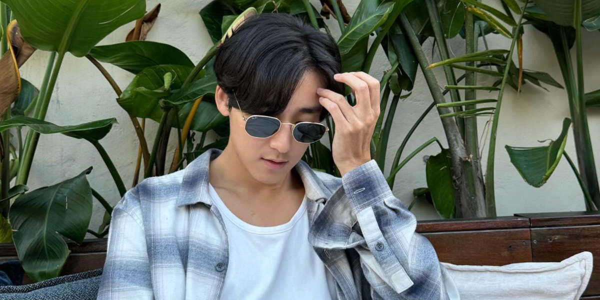 Actor and singer Kevin Woo was seen wearing Ray-Ban RB 3548N 001 Hexagonal Gold With Flat Lenses sunglasses in his Instagram post, October 2023.