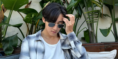 Actor and singer Kevin Woo was seen wearing Ray-Ban RB 3548N 001 Hexagonal Gold With Flat Lenses sunglasses in his Instagram post, October 2023.