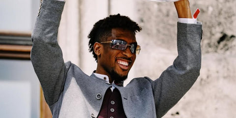 French footballer Kingsley Coman was seen wearing gold Cartier Panthere CT0503S 004 sunglasses with brown mirrored lenses while celebrating Bayern Munich’s Bundesliga title win in May 2025. Shop online now on Pretavoir