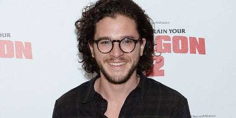 Kit Harington is seen wearing Oliver Peoples Gregory Peck OV5186 1005 Black glasses during one of How To Train Your Dragon 2 promotional tours