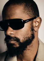 LaKeith Stanfield was seen wearing black Saint Laurent Sun SL 569 Y 001 sunglasses in an ICON Magazine feature