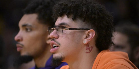 LaMelo Ball is seen wearing a pair of personalised Cartier Buffalo Horn CT0021RS 001 OJP sunglasses encrusted with diamonds