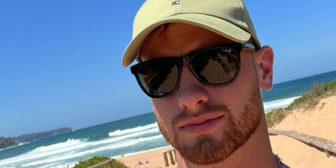 Australian former football player and television personality Lachlan McLean of the Made In Chelsea: Sydney, was seen wearing black Ray Ban RB 4184 601 sunglasses in a social media post.