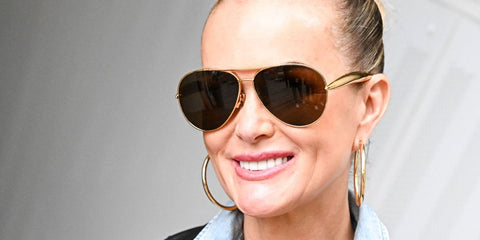 French modal and philanthropist Laeticia Hallyday was seen wearing gold Bottega Veneta BV1305S 007 aviator sunglasses with brown lenses at the 2025 French Open