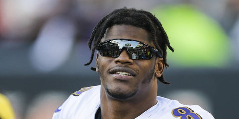 Lamar Jackson is seen wearing Oakley Radar EV Path OO9208 52 Prizm sunglasses in one of his matches