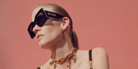 Dutch model Lara Stone was seen wearing black Versace 4496U GB1/87 sunglasses in the Versace Eyewear Spring/Summer 2025 campaign. Shop online now on Pretavoir
