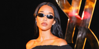 Laura Harrier wore black Saint Laurent Sun SL 935 001 oval sunglasses at the Saint Laurent Spring Summer 2027 show during Paris Fashion Week.