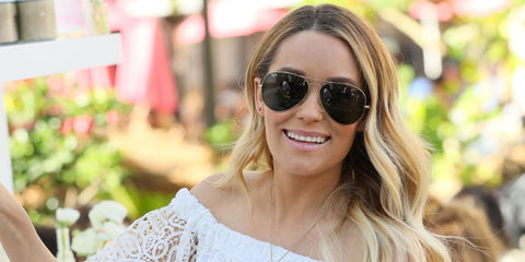 Lauren Conrad was seen wearing gold Ray-Ban Aviator II RB 3026 L2846 large oversized sunglasses. Buy now on Pretavoir