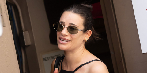 Lea Michele was seen wearing Saint Laurent Sun SL 692 003 oval sunglasses with green lenses in New York City, June 2026.