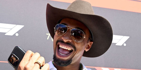 German decathlete Leo Neugebauer was seen wearing Ray-Ban Aviator 3025 001/51 Gold/Light Brown Gradient sunglasses at the F1 Grand Prix of Austin 2025. Shop online now on Pretavoir