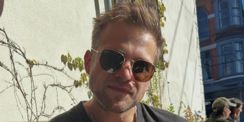 Leo Woodall was seen wearing gold Ray-Ban Hexagonal RB 3548N 001/57 sunglasses with brown Polarised lenses in his Instagram post, July 2026.