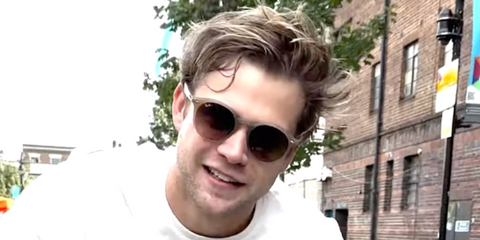 Leo Woodall wears Ray-Ban RB 4305 6166/13 sunglasses in British Vogue's YouTube series "A Day in the Life"