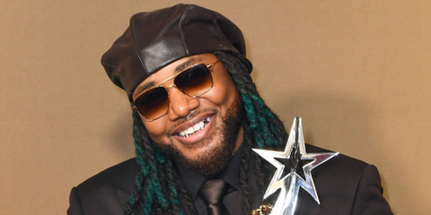 Leon Thomas III was seen wearing gold Dita Artoa 57 DTS 181 01 sunglasses with brown gradient lenses at BET Awards 2026