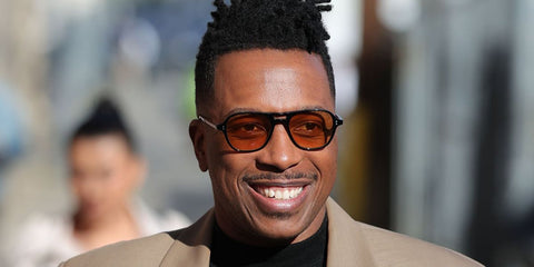 Leslie Odom Jr. was seen wearing black Garrett Leight Doc 2109 BIO BK/SFDES aviator sunglasses with yellow lenses in Los Angeles, March 2026.
